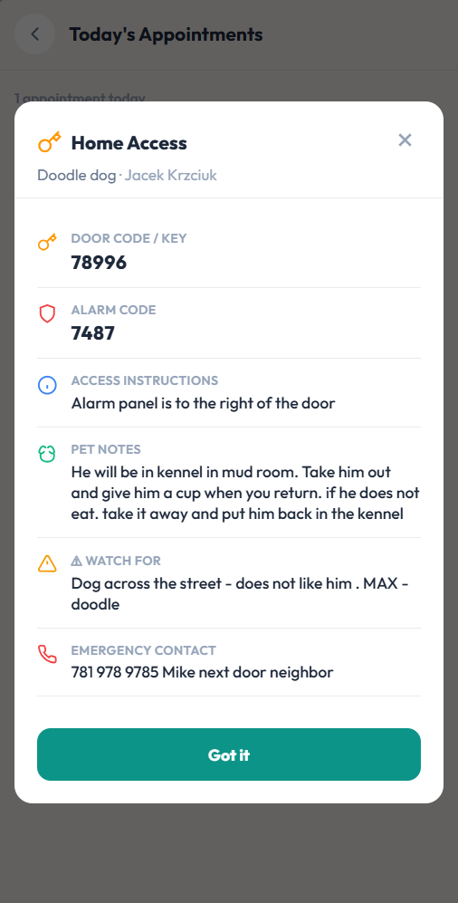 Mobile Home Access card the sitter pulls up at the door showing the door code 78996, alarm code 7487, access instructions about the alarm panel location, pet notes about the dog being in the kennel in the mud room, a watch-for note about the dog across the street, and an emergency contact for Mike the next-door neighbor